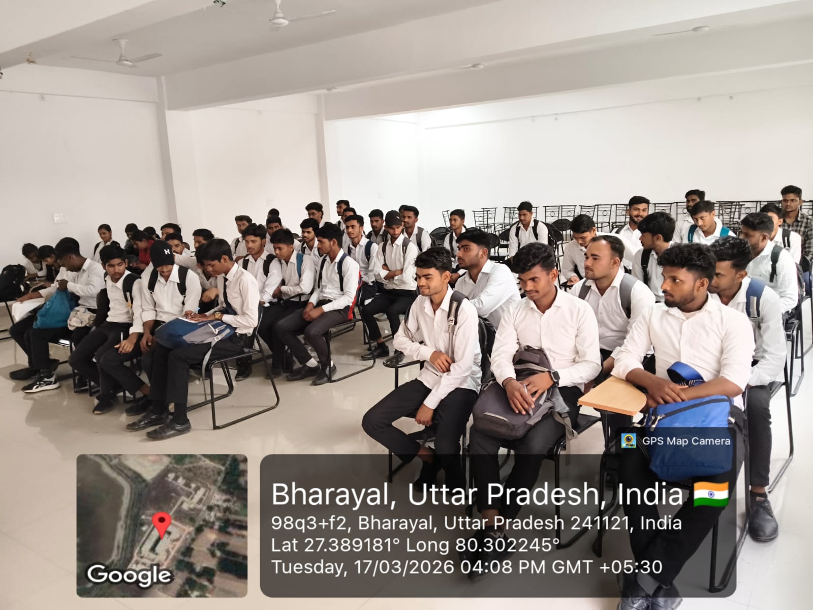 Students seated in lecture hall classroom